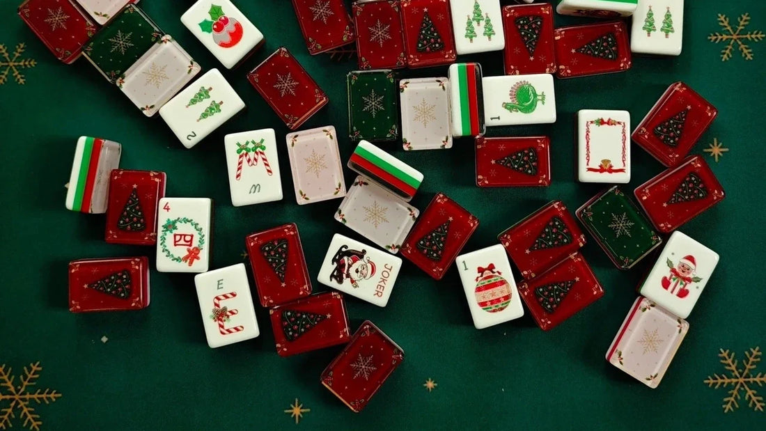 Face-up and decorative-backed BamChive Christmas Mahjong tiles shown together on a green mat.