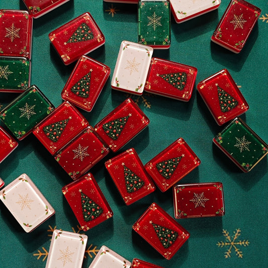 BamChive Christmas Magic American Mahjong tiles showing four holiday tile-back styles on a festive green mat