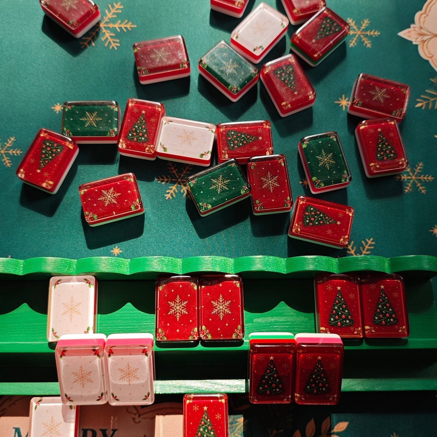 BamChive Christmas Magic American Mahjong tiles in four holiday styles arranged on green racks