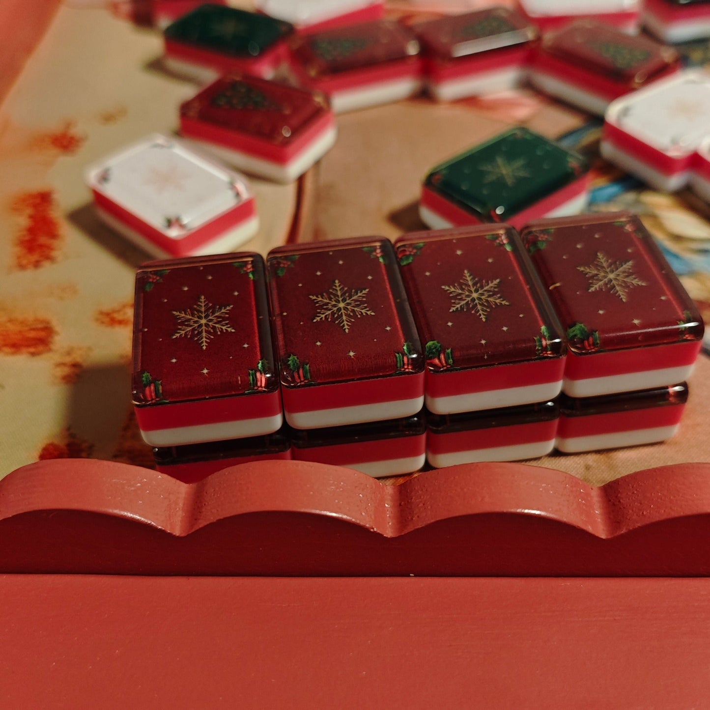 Close-up of red snowflake backs on BamChive Red Christmas Star American Mahjong tiles